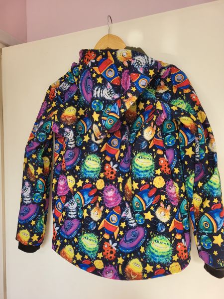 Coat with very colorful aliens
