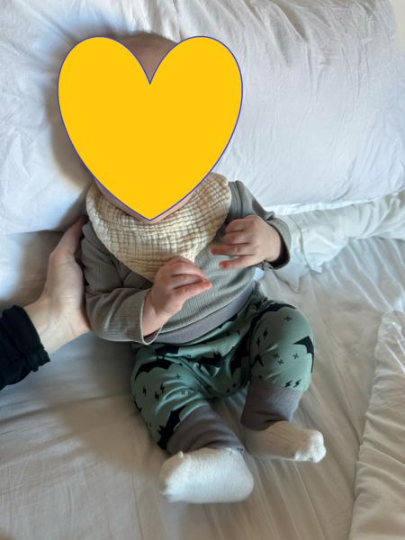 Baby with pants Sammy on