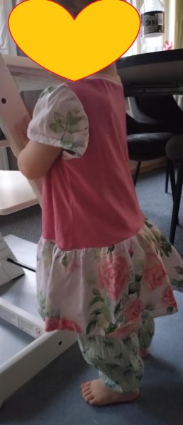 Girl with Karin dress on and Sammy pants under.