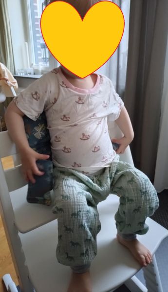 Child with pants Sammy and shirt Marcus on