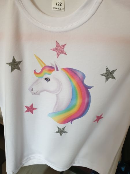 HTV pressed on a shirt. A unicorn and stars