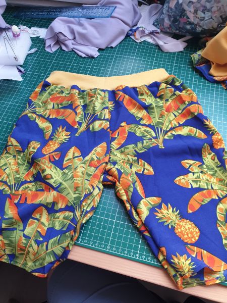 Blue shirts with a tropical pattern